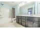 Bathroom with tub shower, dual vanity, and tile flooring at 9001 Lanark Ln, Indian Land, SC 29707