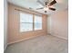 Bedroom with plush carpet, natural light, and a ceiling fan at 9001 Lanark Ln, Indian Land, SC 29707