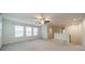 This spacious bonus room has plush carpet and natural light at 9001 Lanark Ln, Indian Land, SC 29707