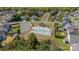 Aerial view of a community pool with a playground and parking, perfect for outdoor recreation and Gathering fun at 9001 Lanark Ln, Indian Land, SC 29707