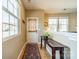 Inviting hallway featuring a console table, decorative rug, and a view of the living area at 9001 Lanark Ln, Indian Land, SC 29707