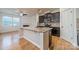 Well-equipped kitchen featuring granite countertops, dark cabinets, and stainless steel appliances at 9001 Lanark Ln, Indian Land, SC 29707