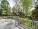 Spacious back deck overlooking a serene, tree-filled backyard at 940 Brittany Ct # 23, Gastonia, NC 28056