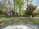 Back deck of home provides a relaxing space overlooking the backyard and storage shed at 940 Brittany Ct # 23, Gastonia, NC 28056