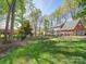 Fenced backyard with a well-maintained lawn and plenty of space at 940 Brittany Ct # 23, Gastonia, NC 28056