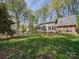 Expansive backyard with lush green grass and a secure black metal fence at 940 Brittany Ct # 23, Gastonia, NC 28056