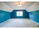 A bedroom with vaulted ceilings, one window and plush carpeting at 940 Brittany Ct # 23, Gastonia, NC 28056