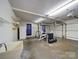 Spacious garage offers ample storage, high ceilings, and a utility sink at 940 Brittany Ct # 23, Gastonia, NC 28056