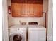 Laundry area with washer, dryer, and plenty of cabinets at 940 Brittany Ct # 23, Gastonia, NC 28056