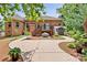 A home with a small deck, shed, landscaped yard, and a wide concrete walkway at 9506 Minnie Lemmond Ln # 170, Mint Hill, NC 28227
