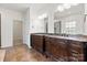 Beautiful bathroom featuring a granite-topped double vanity at 9506 Minnie Lemmond Ln # 170, Mint Hill, NC 28227