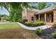 Well-maintained home with manicured landscaping, a brick exterior, and a covered front porch at 9506 Minnie Lemmond Ln # 170, Mint Hill, NC 28227