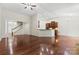 Spacious living room boasts hardwood floors and an open floor plan perfect for entertaining at 9506 Minnie Lemmond Ln # 170, Mint Hill, NC 28227