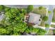 Aerial shot of home with a well-maintained yard, patio, and lush greenery in a quiet neighborhood at 9506 Minnie Lemmond Ln # 170, Mint Hill, NC 28227