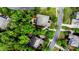 Aerial view of house with beautiful green landscaping and a paved road in a quiet neighborhood at 9506 Minnie Lemmond Ln # 170, Mint Hill, NC 28227