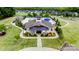 Community clubhouse and pool with manicured landscaping and a neighborhood of single-Gathering homes in the background at 9506 Minnie Lemmond Ln # 170, Mint Hill, NC 28227