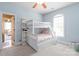 Charming bedroom featuring bunkbeds, soft blue walls, and carpeted floor at 11308 Wheat Ridge Rd, Charlotte, NC 28277