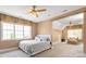 Bright bedroom with sitting room, large windows, and plush carpet at 11308 Wheat Ridge Rd, Charlotte, NC 28277
