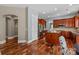 Gourmet kitchen with stainless steel appliances, custom cabinets, and a granite-topped island at 11308 Wheat Ridge Rd, Charlotte, NC 28277