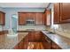 Kitchen featuring granite countertops, a stainless steel sink, and a modern microwave at 11308 Wheat Ridge Rd, Charlotte, NC 28277