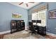 Functional home office with a large window, built-in shelving, and a comfortable workspace at 11308 Wheat Ridge Rd, Charlotte, NC 28277