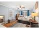 Bedroom with hardwood floors, large window, ceiling fan, and neutral colored walls at 1197 Fincher Rd, Fort Lawn, SC 29714