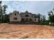 Attractive two-story home with stone accents and covered porch on a large lot at 1204 Sage Pine Cir, Clover, SC 29710