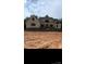 New construction home with a modern farmhouse exterior and a large front yard, beautiful windows at 1204 Sage Pine Cir, Clover, SC 29710