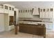 Unfinished kitchen with an island, cabinets, and modern amenities ready for customization and design at 1204 Sage Pine Cir, Clover, SC 29710