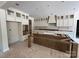 Unfinished kitchen features cabinets, an island, and modern amenities ready for customization at 1204 Sage Pine Cir, Clover, SC 29710