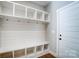 A mud room with coat hooks, bench, and cubbies at 1204 Sage Pine Cir, York, SC 29710