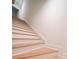 A staircase leading to the second floor with oak treads at 1204 Sage Pine Cir, York, SC 29710