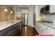 Well-equipped kitchen features stainless steel appliances, granite counters, and ample storage space at 122 Fordingbridge Ln, Mooresville, NC 28115