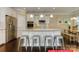 Spacious kitchen featuring stainless steel appliances, granite island and seating at 122 Fordingbridge Ln, Mooresville, NC 28115