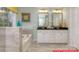 Luxury main bathroom featuring a soaking tub, double vanity, and modern finishes at 122 Fordingbridge Ln, Mooresville, NC 28115