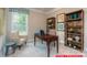 Office space with large window, desk, chair, bookshelf, carpet and natural light at 122 Fordingbridge Ln, Mooresville, NC 28115
