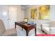 Bright office space featuring a desk, chair, and artwork at 122 Fordingbridge Ln, Mooresville, NC 28115