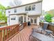 Well-maintained deck featuring seating and outdoor grill for delightful outdoor gatherings at 12708 Hollyhock Ln, Huntersville, NC 28078