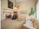 Vaulted ceiling living room showcasing ample seating, natural light, and elegant decor at 12708 Hollyhock Ln, Huntersville, NC 28078