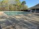 Community pool featuring an expansive pool deck and lounge chairs at 12708 Hollyhock Ln, Huntersville, NC 28078