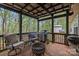 Spacious back porch with a grill, seating, and a fire pit, perfect for outdoor gatherings at 12804 Lismorre Castle Ct, Charlotte, NC 28273