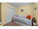 Small bedroom with a twin bed, built in storage, carpeted flooring, and ample natural light at 12804 Lismorre Castle Ct, Charlotte, NC 28273