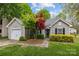 Charming single-story home with a manicured front yard and lovely landscaping at 12804 Lismorre Castle Ct, Charlotte, NC 28273