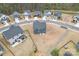 Aerial view of homes showcasing backyard sizes in a neighborhood at 1409 Augustus Beamon Dr, Indian Trail, NC 28079