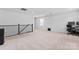 Spacious bonus room featuring neutral carpet, ample light, and space for an entertainment area at 1409 Augustus Beamon Dr, Indian Trail, NC 28079
