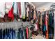 Walk-in closet with ample hanging space and shelving for organized storage at 1409 Augustus Beamon Dr, Indian Trail, NC 28079