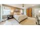 Bedroom featuring neutral walls, plush carpet, and an armoire with a geometric pattern at 1529 S Wendover Rd, Charlotte, NC 28211