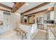 Bright kitchen boasts a central island with cooktop, white cabinets, stainless appliances, and ample space at 1529 S Wendover Rd, Charlotte, NC 28211