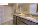 This bathroom includes double sinks with granite countertops and a shower-tub combo at 158 Ventor Way, Mooresville, NC 28115