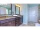 Elegant bathroom featuring dual vanities, granite countertops, and stylish fixtures at 158 Ventor Way, Mooresville, NC 28115